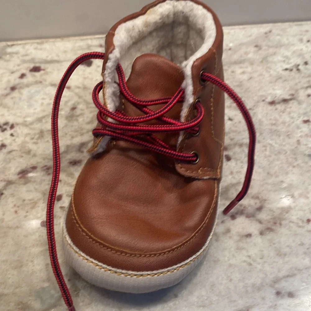 Baby Gap size 18-24 months brown bootie with Sherpa lining. Red laces. Like new